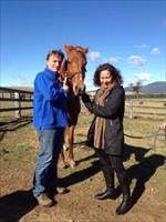 Chris and Jane sharing the love with their mare Legally Bay...