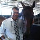 Steve Allam hugs Lone Command after his class record win at Rosehill